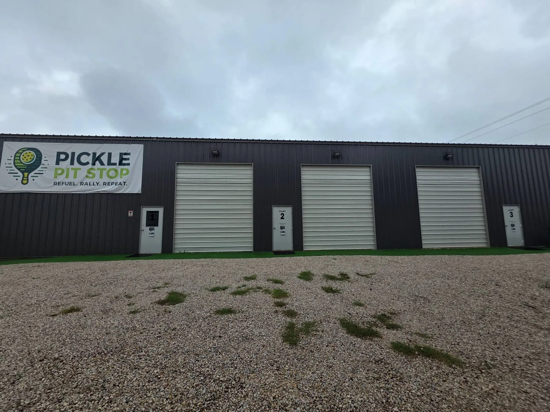 The court building with numbered doors for Courts 1, 2, and 3