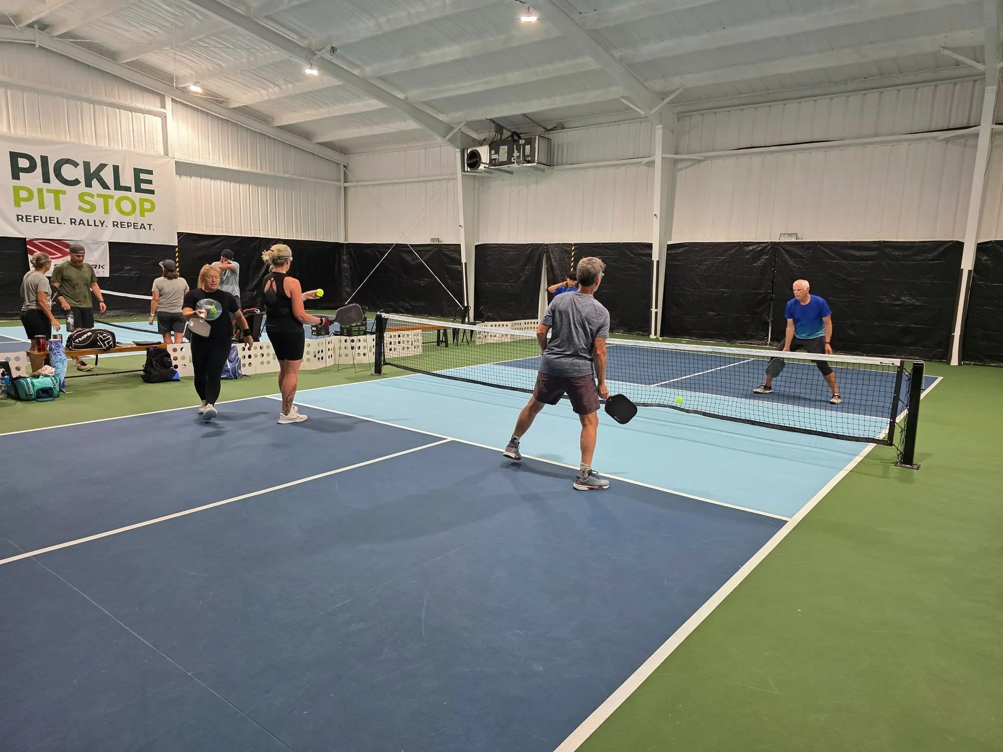 Players rallying during Open Play at Pickle Pit Stop